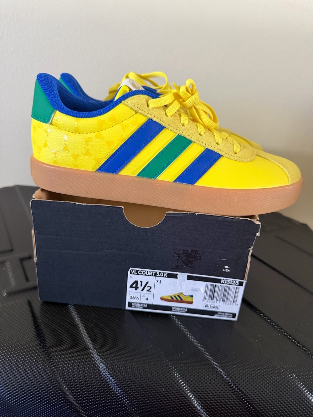 adidas Kids Yellow Sneakers with Blue and Green Stripes